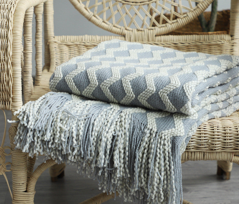 knit throw blanket with tassels in blue colour