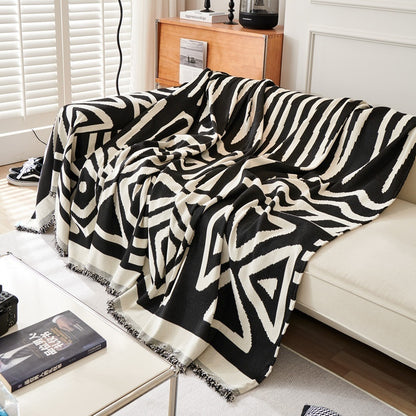 geometric design boho sofa cover in black color on sofa