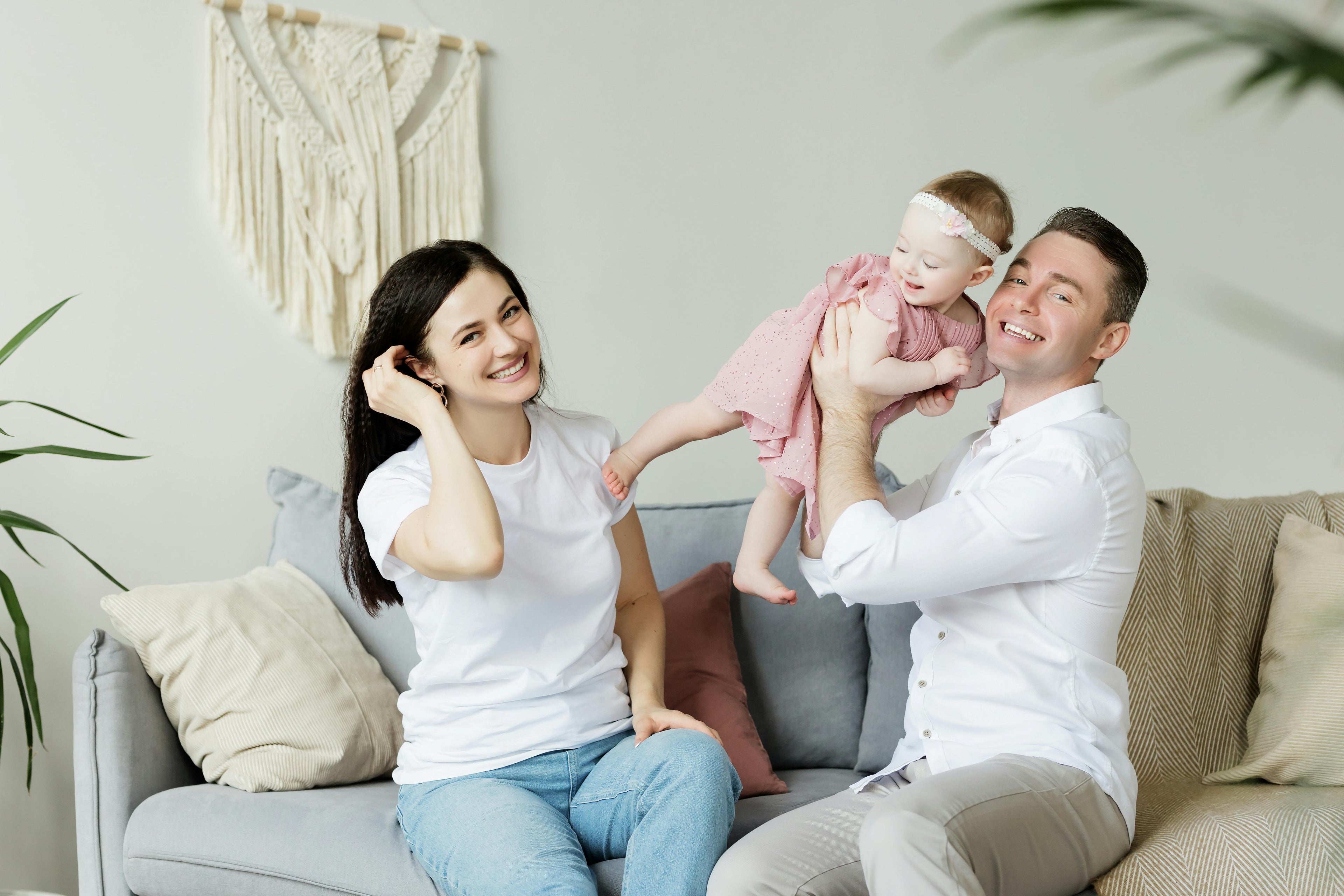 odivaro.com homepage image a beautiful family seating on a sofa
