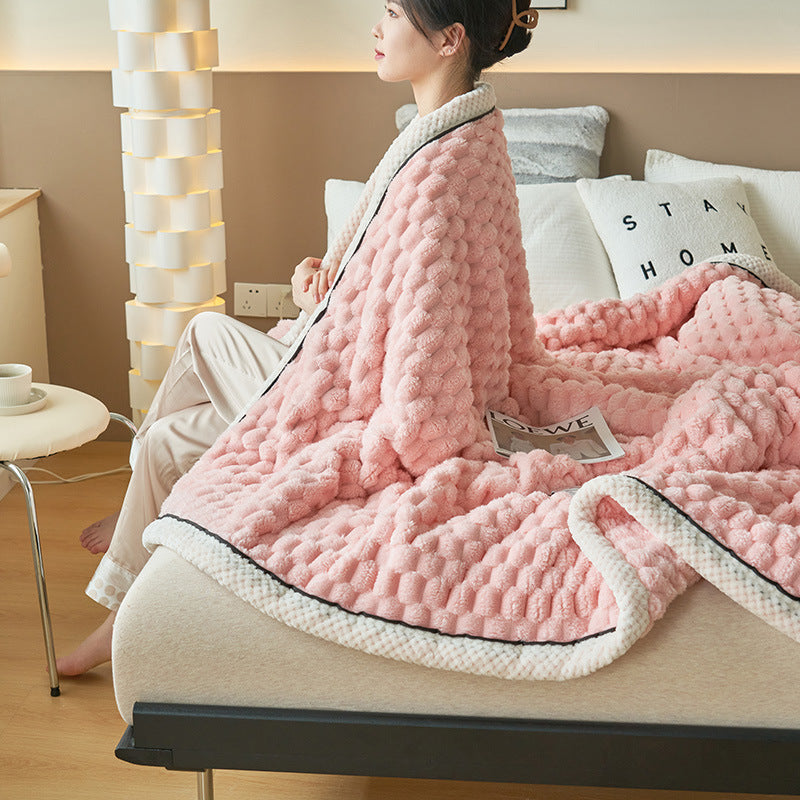 girl wearing pink  coral flannel warm blanket