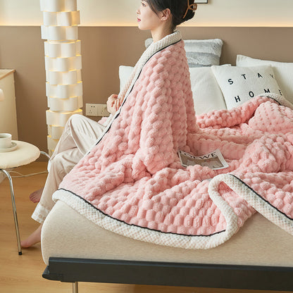 girl wearing pink  coral flannel warm blanket